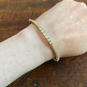 Graziano Gold Tone Metal Bangle Bracelet with Rhinestones